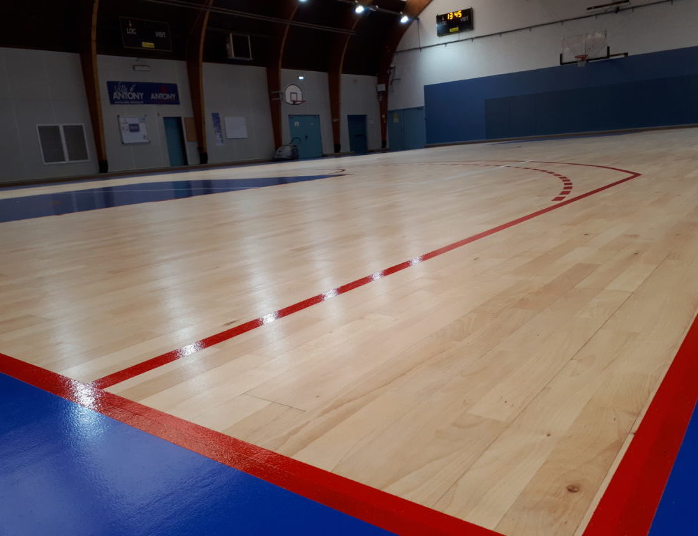 Réalisation Parquet pour Terrain de Basketball