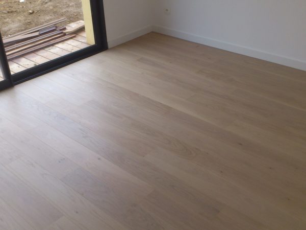 Pose de Parquet Contrecollé par Univers Parquet